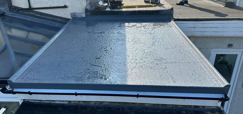 Flat roof finished with neat edge trims